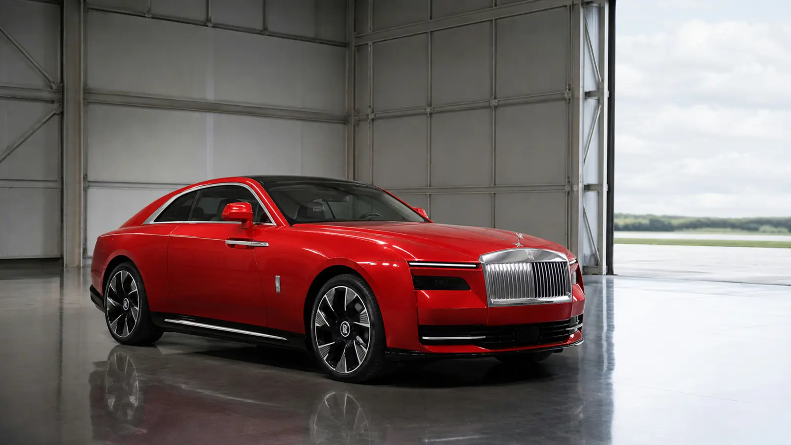АВТО 1003279 ярко-красный Rolls-Royce Spectre целиком в отражающей архитектуре
