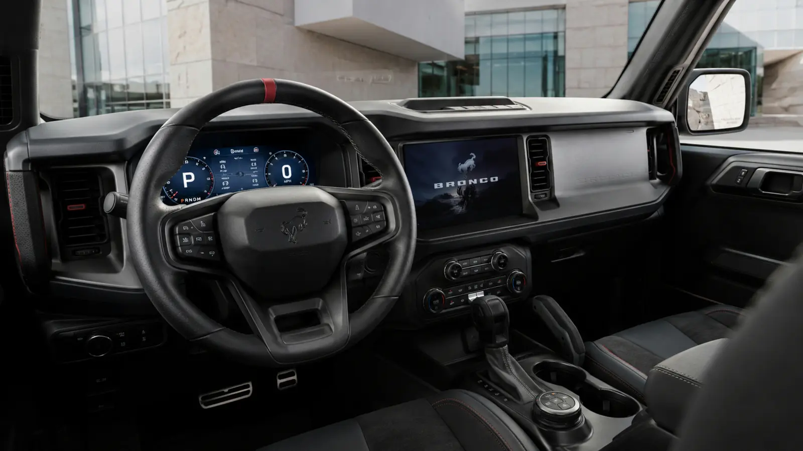 АВТО 1003321 бордовый Ford Bronco Raptor крупно руль и приборная панель