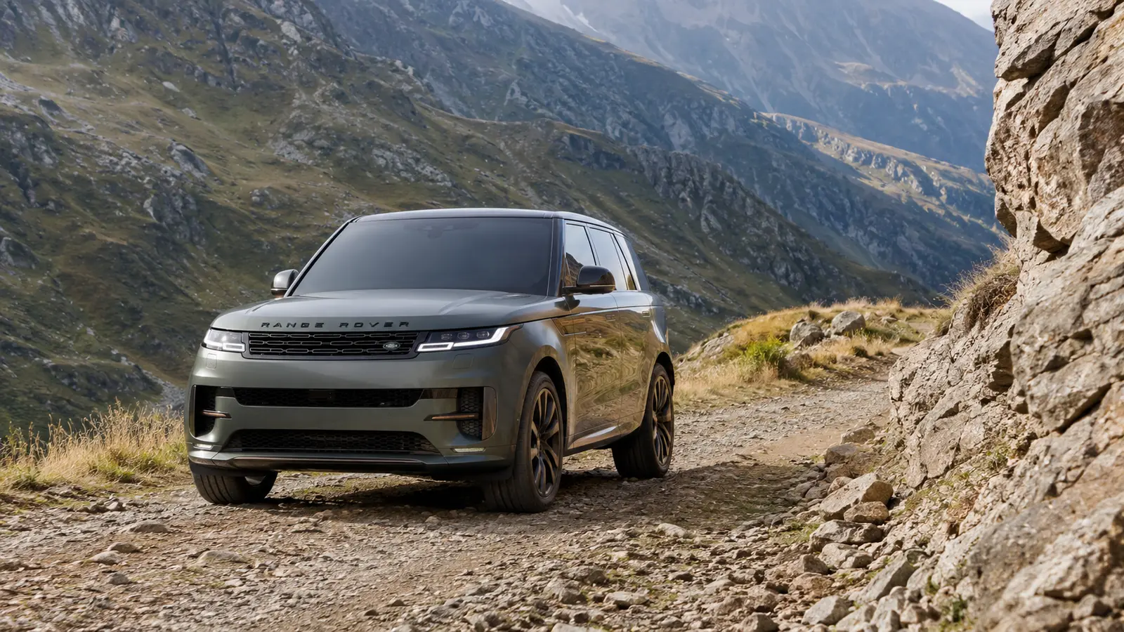 АВТО 1000609 зелёный Range Rover на каменистой горной дороге