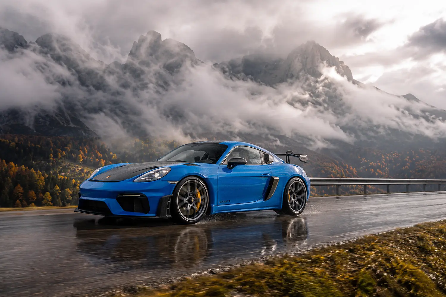 АВТО 1003502 синий Porsche 718 Cayman GT4 RS в Альпах