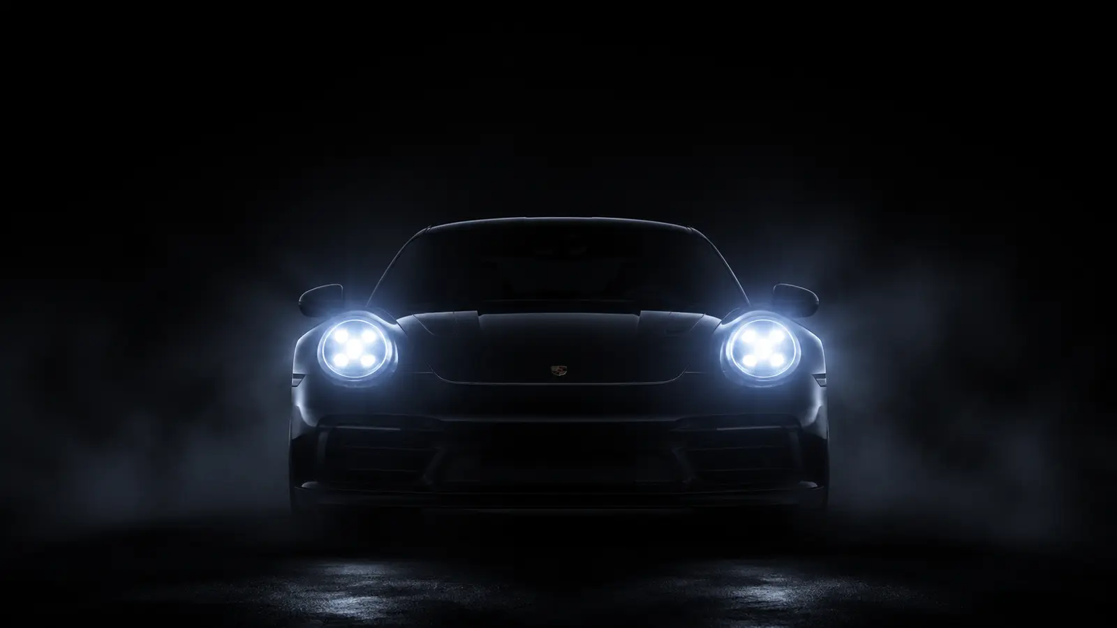 АВТО 1000683 тёмный Porsche 911 выходит из темноты со светом фар