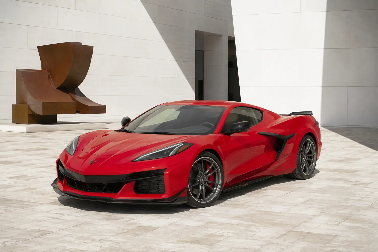 АВТО 1003719 красный Chevrolet Corvette Z06 у белого музея