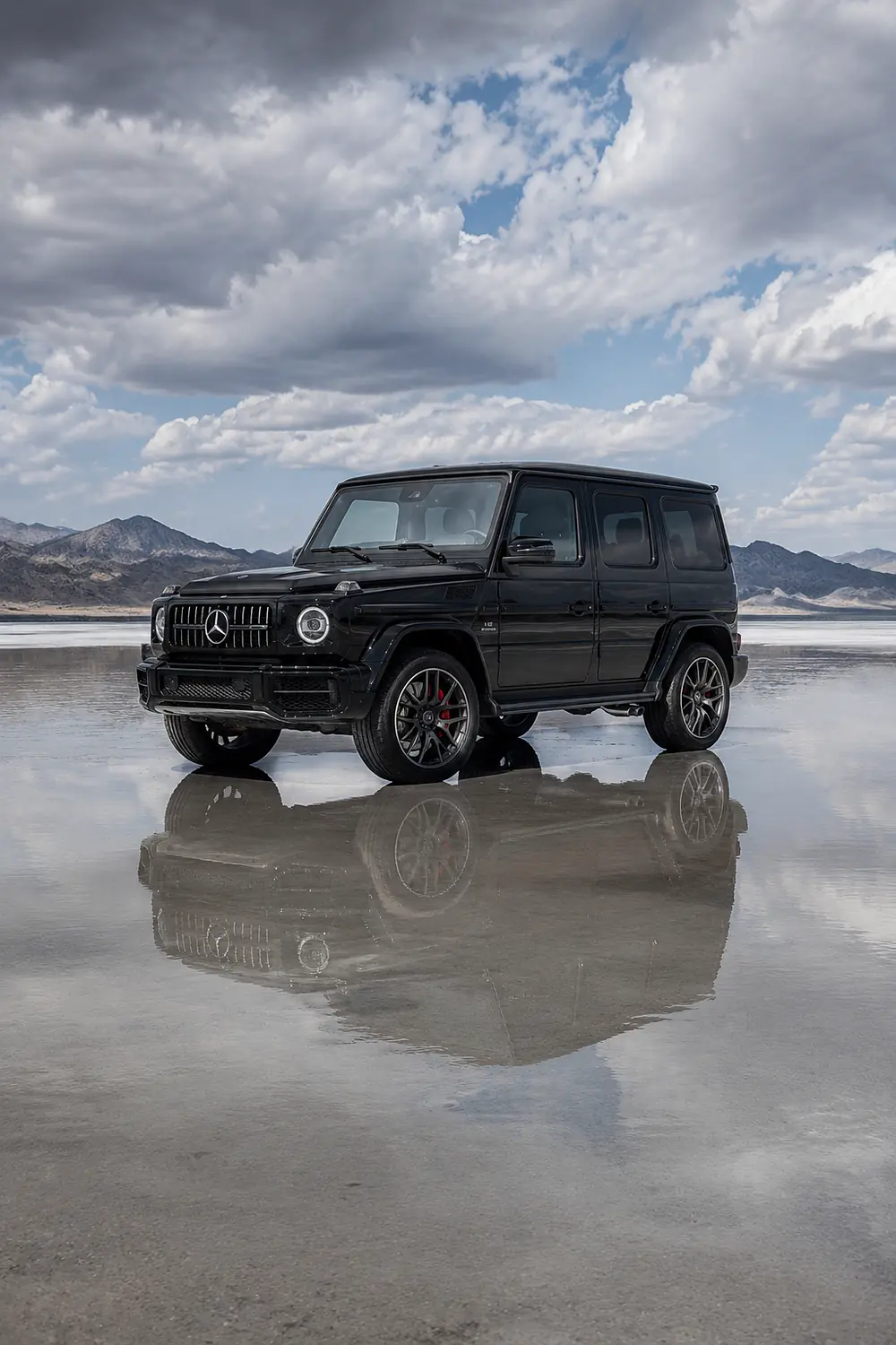 АВТО 1003606 чёрный Mercedes-AMG G 63 на зеркальном солончаке