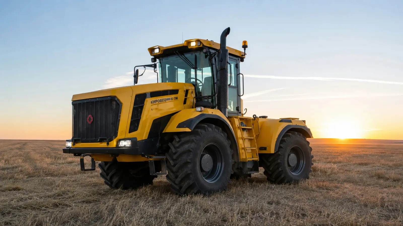 АВТО 1003380 фирменный жёлтый Kirovets K-7M крупно передний три четверти на закате